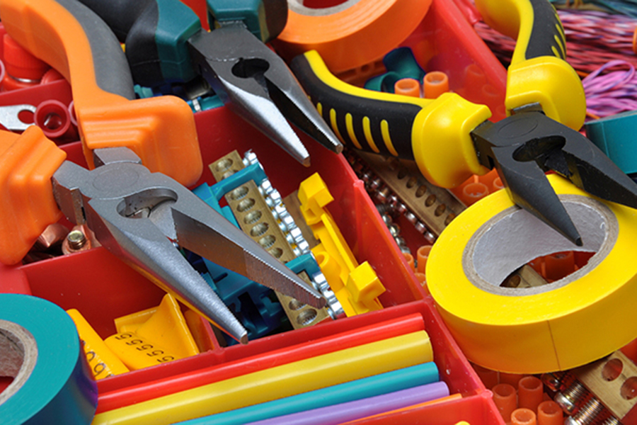 A photo of colorful electrical tools illustrates nonprofit communications tools