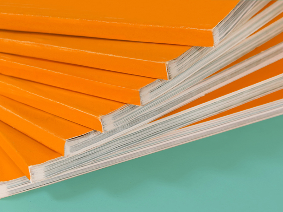 Stack of colorful annual reports