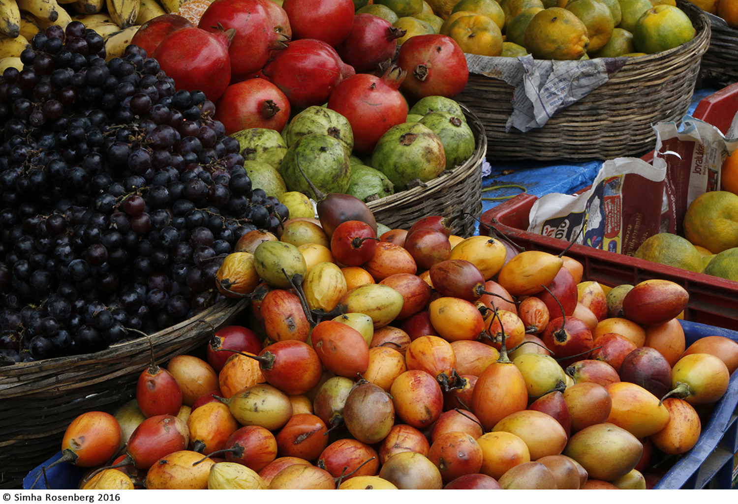 An image of lush fruit at a market is a metaphor for the impact of producing fresh nonprofit content.