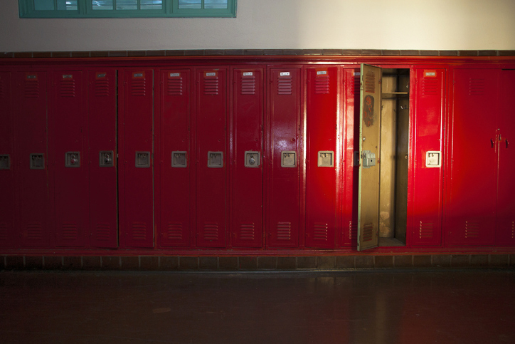 Row of empty lockers illustrate how words fail for student on day MLK was assasinated.